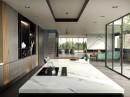 Wnętrze z białą marmurową wyspą kuchenną oraz szarymi płytkami ścienno-podłogowymi Porcelanosa Liem Grey Nature