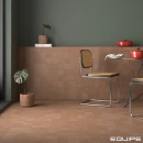 Jadalnia z płytkami Equipe Stage Terracotta 20x20 wyłożonymi na ścianie i podłodze