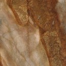 Płytka gresowa szkliwiona imitująca marmur, w kolorze pomarańczowym, powierzchnia poler Paradyż Ceramika Abstract Rust Poler 119,8x119,8