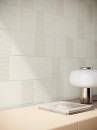 Beżowe pytki ścienne imitujące beton, z matową i strukturalną powierzchnią Porcelanosa Block Cancun Caliza