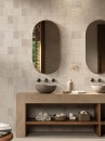 Płytka ścienna imitująca kamień, w kolorze beżowym, strukturalna, matowa powierzchnia Porcelanosa Block Dorcia Bone
