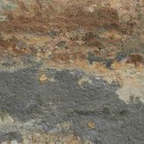 Multikolorowa płytka ceramiczna Marazzi Rocking Multicolor Strutturato M173 o wymiarach 30x30 cm, z widoczną strukturalną powierzchnią imitującą nieregularny kamień, z odcieniami rdzawego brązu, szarości, błękitu i beżu, nadająca naturalny i surowy wygląd