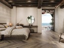 Sypialnia z płytkami podłogowymi drewnopodobnymi Porcelanosa Bruselas Walnut