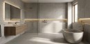 Nowoczesna łazienka w stylu minimalistycznym, ściany i wnęki wyłożone są strukturalnymi płytkami Marazzi Mystone Tivoli Grigio ze wzorem 3D w poziome prążki, wnętrze wyposażono w wolnostojącą, kamienną wannę, prysznic typu walk-in ze szklaną ścianką