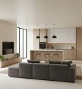 Nowoczesny salon połączony z kuchnią, na podłodze i ścianie widoczne wielkoformatowe białe płytki Marazzi Resin Bianco 120x120 cm imitujące beton, w tle minimalistyczna zabudowa kuchenna w kolorze jasnego drewna i bieli i wyspa kuchenna z hokerami