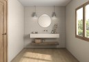 Płytka ścienna imitująca beton w beżowym odcieniu, wykończenie powierzchni matowe, Pamesa Lin Marfil Matt 60x120 położona na ścianie w  jasnej łazience gdzie znajduje się drewniana półka, wisząca umywalką oraz okrągłe lustro