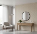 Mozaika dekoracyjna, kamienna w beżowym odcieniu, Lantic Colonial Herringbone Durango Bone 26x28 100351892 położona na ścianie w jasnym pokoju z drewnianą szafką oraz jasnym fotelem