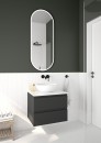 Łazienka z czarną szafką wiszącą, owalnym lustrem oraz białą umywalką nablatową Oltens Etne 40x33 cm 40313000