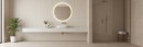 Nowoczesna łazienka w ciepłych odcieniach beżu, w której główną dekorację ściany stanowią płytki Marazzi Room Wall 3D Match Beige 30x90 MP6E o pionowej, prążkowanej strukturze, aranżację uzupełnia minimalistyczna biała umywalka na długim blacie