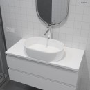 Łazienka z białą szafką, srebrną baterią oraz białą owalną nablatową umywalką Oltens Lom