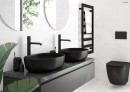 Oltens Hamnes Stille stylowa czarna miska wisząca WC PureRim SmartClean 42521300 Designerska toaleta wisząca w jasnej łazience z ciemną szafką. Brak deski w zestawie