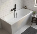 Oltens Lykke elegancka wanna prostokątna 170x70 cm akrylowa w białym kolorze 10011000 nowoczesny design łączy z trwałością materiału, zapewniając komfort użytkowania zabudowana płytkami w jasnej łazience