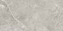 Gres Blustyle Unica Stone 60x120 prezentuje głęboki, szary odcień z wyraźnym, jasnym żyłowaniem. Matowa tekstura inspirowana naturalnym kamieniem tworzy surowy, a zarazem elegancki efekt, idealny do nowoczesnych wnętrz w stylu loftowym i minimalistycznym.