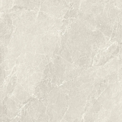 Gres Blustyle Advantage Chalk Lapp 120x120 w jasnym, kremowym odcieniu z delikatnym, białym żyłowaniem. Półpolerowana powierzchnia lappato subtelnie odbija światło, wydobywając naturalną teksturę kamienia. Idealna baza do jasnych, luksusowych wnętrz.