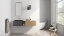 Płytka ścienna, strukturalna w białym kolorze, wykończenie powierzchni w połysku, Pamesa Dernia Blanco 30x90 położona na ścianie w łazience gdzie znajduje się biała wanna, umywalka oraz wiszące lustro