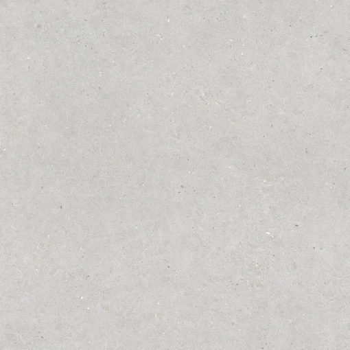 Gres Durstone Somport Light Natural 120x120 na ścianach i podłodze luksusowej łazienki. Jasnoszare płyty o teksturze wapienia tworzą spójną bazę dla drewnianej szafki i dwóch luster. Minimalistyczny design i naturalne światło nadają wnętrzu styl.