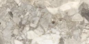 Prime Ceramics Aragonite White 60x120 o efektownej strukturze brekcji. Dynamiczny wzór łączący jasne i szare odłamki skalne tworzy luksusową powierzchnię imitującą naturalny konglomerat. Idealny wybór na reprezentacyjne ściany i podłogi.
