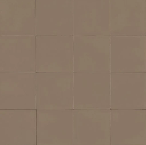Kwadratowe płytki Marazzi Confetto Corda 10x10 cm w kolorze ciepłego beżu. Zdjęcie prezentuje matową, gładką powierzchnię kilkunastu płytek ułożonych obok siebie, tworzących spójną kompozycję o nowoczesnym charakterze.