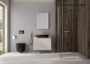 Oltens Nordlis lustro 60x80 cm prostokątne z oświetleniem z przodu z matą grzewczą czarny 64116300 - lustro powieszone na ścianie w łazience gdzie znajduje się biała szafka z czarną umywalką oraz duży prysznic