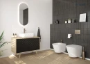 Oltens Nordlis lustro 40x90 cm owalne z oświetleniem z przodu z matą grzewczą 64103000 - lustro zawieszone na ścianie w łazience gdzie znajduje się szafka z białą umywalka oraz wisząca miska WC