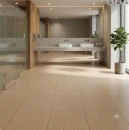 Wizualizacja nowoczesnej łazienki publicznej z podłogą wyłożoną kwadratowymi, matowymi płytkami gresowymi Marazzi SistemT Graniti Sabbia 30x30 MRT5 w beżowo-piaskowym odcieniu o drobnoziarnistej strukturze granitu.
