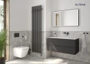 Oltens Stang grzejnik łazienkowy 180x48 cm grafit 55030400 - grzejnik zawieszony na ścianie w łazience gdzie znajduje się biała wisząca miska WC oraz wisząca szafka z białą umywalką