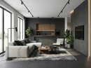 Nowoczesny salon połączony z kuchnią z matowymi płytkami podłogowymi imitującymi beton, pochodzenia hiszpańskiego Cifre Acron Anthracite Mate N-Plus SI Rect. 60x120, z czarnymi frontami, szarą kanapą, wyspą kuchenną, drewnianym i metalowym stolikiem.