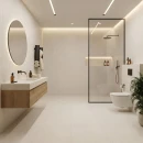 Jasna, beżowa łazienka z płytkami imitującymi beton Cifre Acron Ivory Mate Soft Sl Rc 90x90 SL RC, z kabiną prysznicową  walk-in, deszczownicą, podwieszaną szafką z drewnianym frontem i nablatową umywalką, okrągłym lustrem, czarną armaturą.