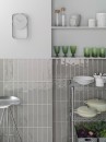Wnętrze z szarymi płytkami w połysku Porcelanosa Malaga Acero 25x44,3